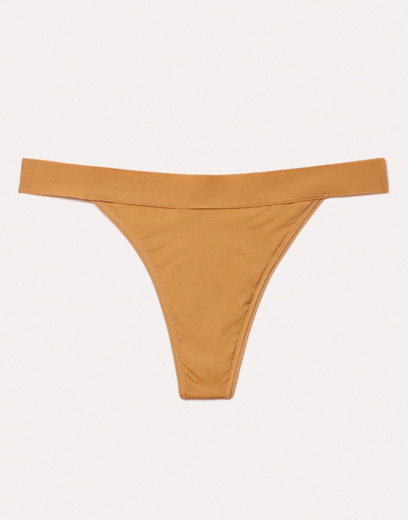 Joyja Leah period-proof panty in color Sand Dry and shape thong