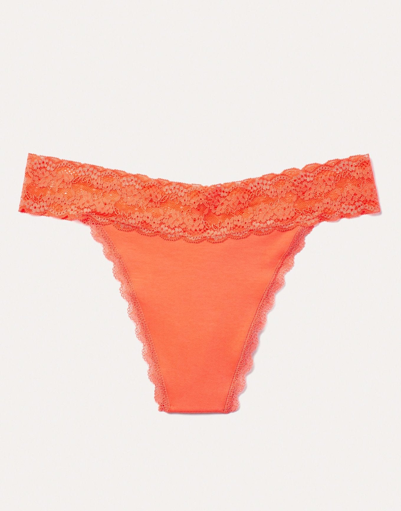 Joyja Lily period-proof panty in color Living Coral and shape thong