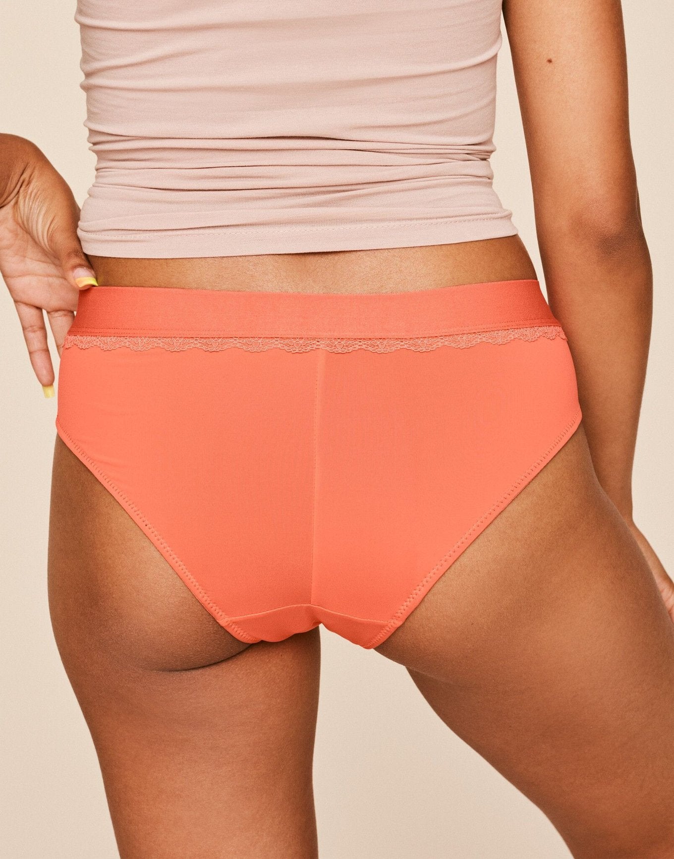 Joyja Cindy period-proof panty in color Living Coral and shape cheeky