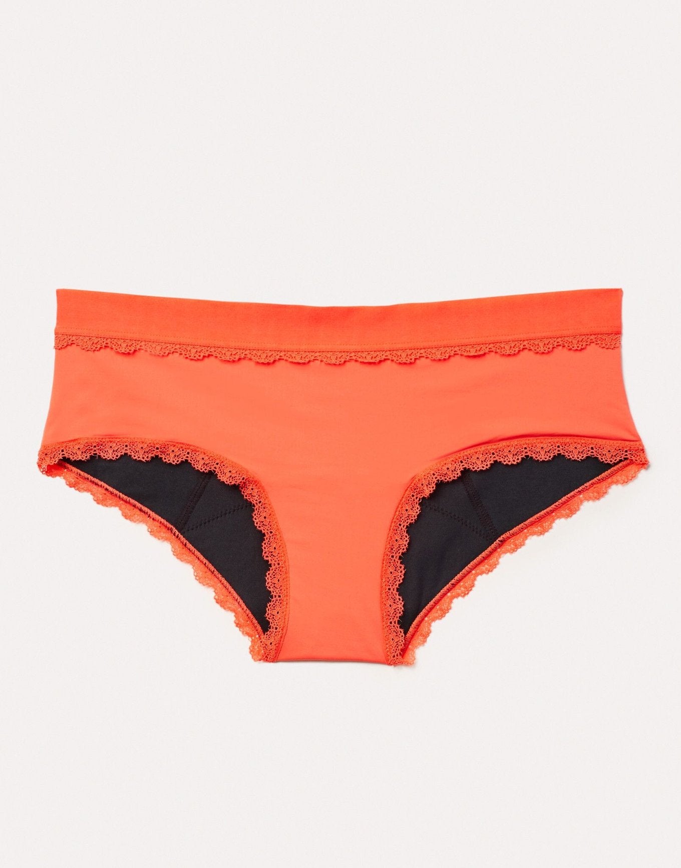 Joyja Olivia period-proof panty in color Living Coral and shape hipster