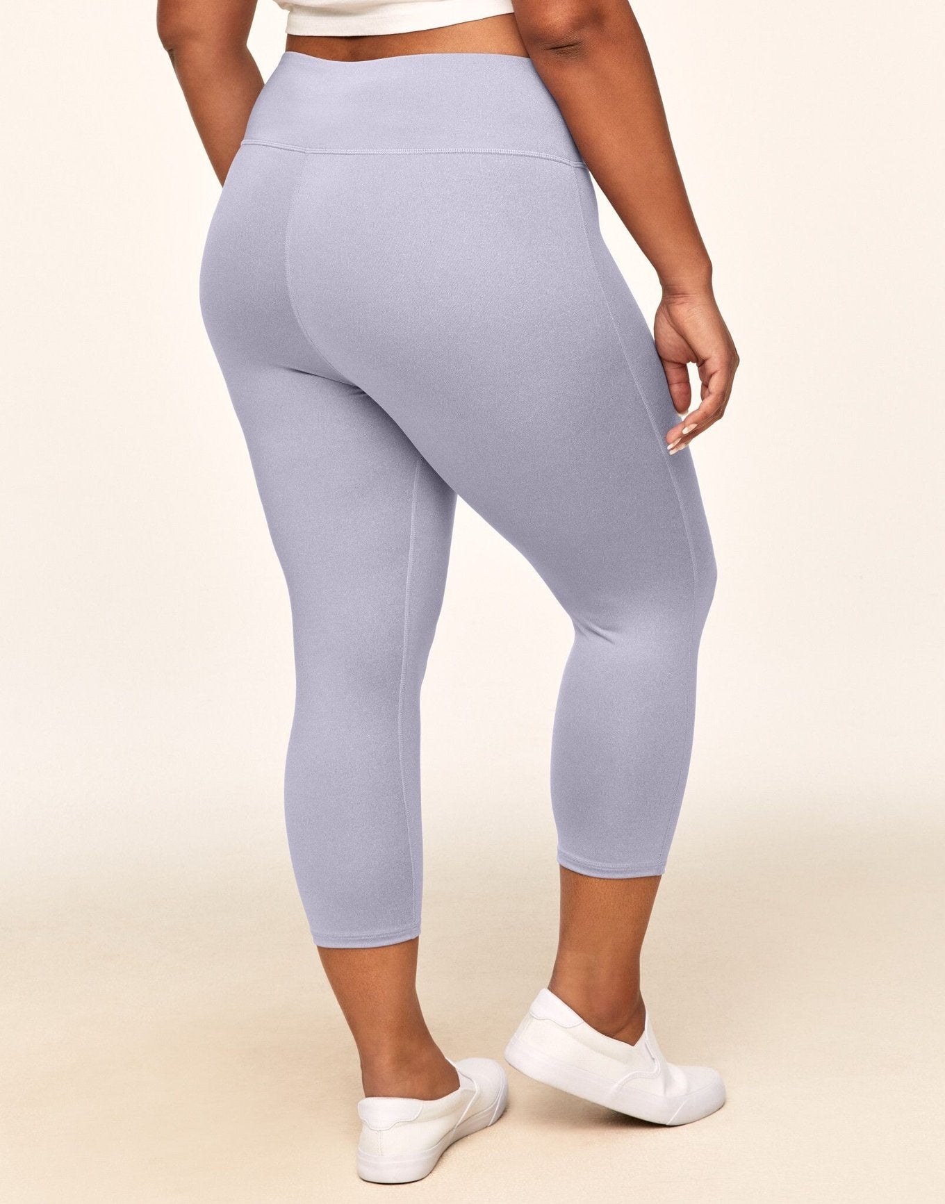 Adore Me Haley Heathered Crop Heather Compression Activewear Crop Legging in color Lavender Blue Heather and shape legging