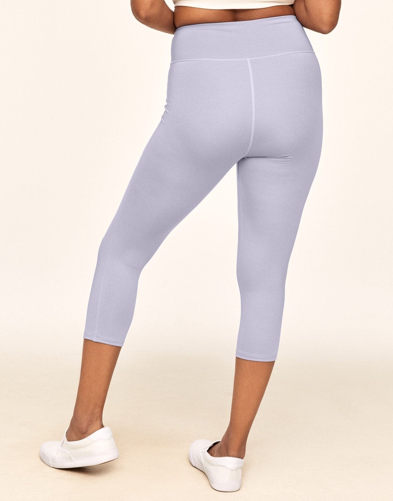 Adore Me Haley Heathered Crop Heather Compression Activewear Crop Legging in color Lavender Blue Heather and shape legging